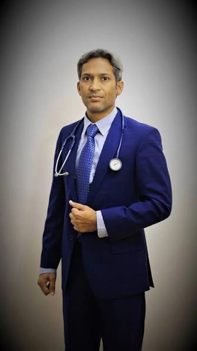 Full portrait of Dr. Muhammad Hussain